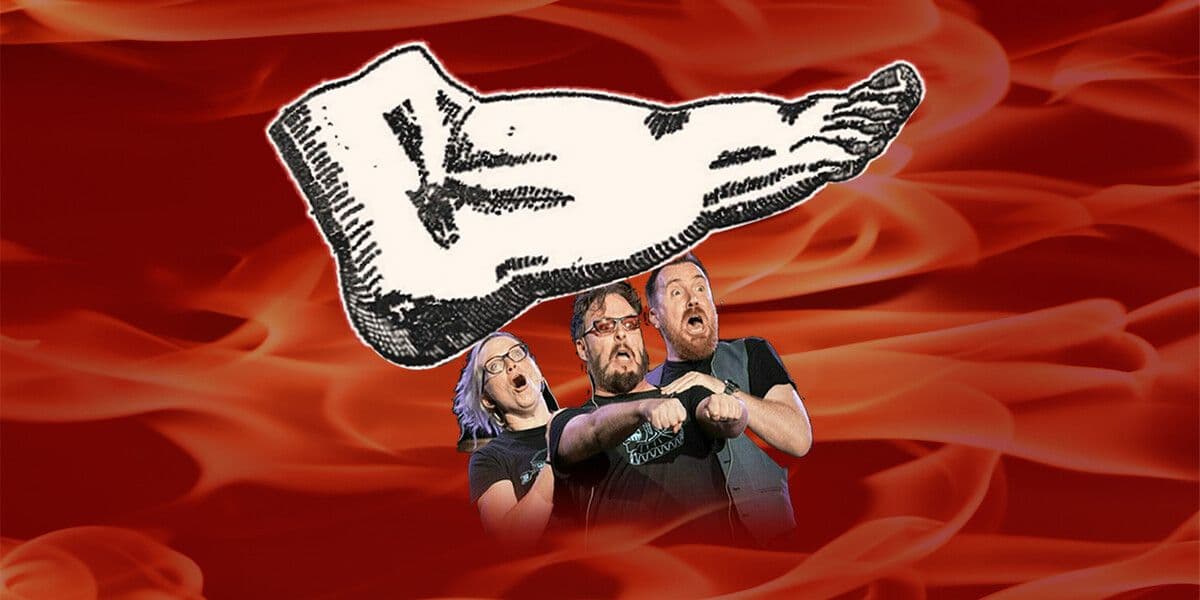 In a background of flames, a giant Pythonesque foot is coming down on 3 very surprised people.